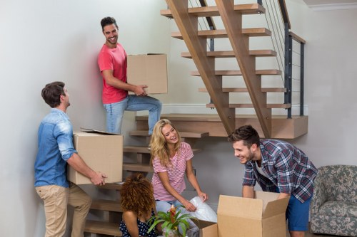 Boxes and household items stored securely in a Raynerslane storage unit