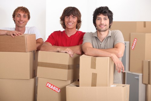 Professional removals team planning a move in Raynerslane