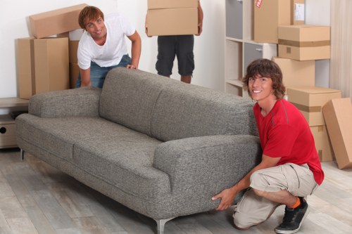 Professional packing services in Raynerslane preparing boxes for a move